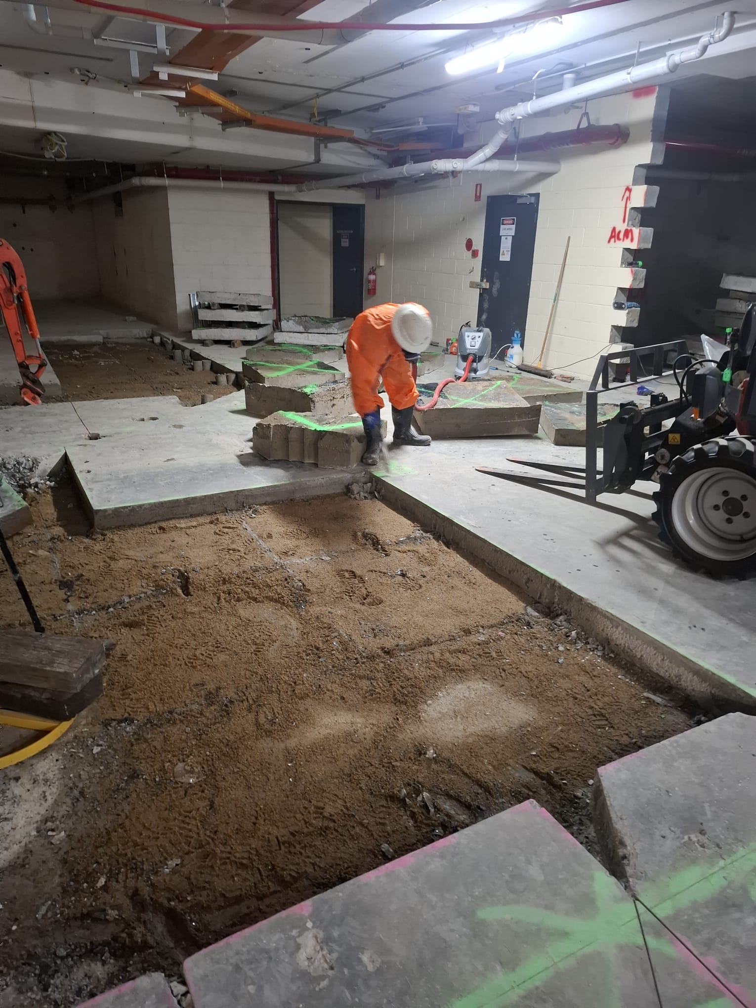 Licensed asbestos abatement on marked ACM site