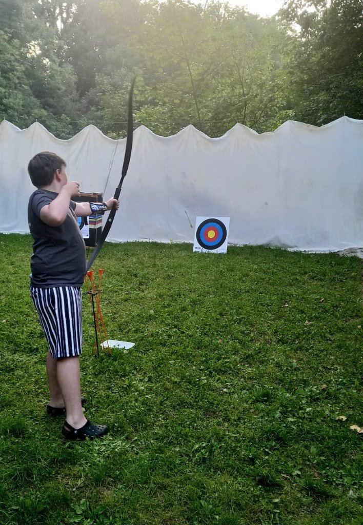 Scout learning archery