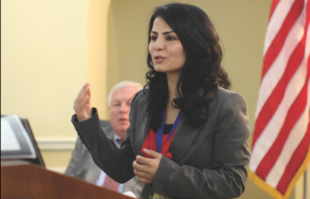 Alaha speaking at community event
