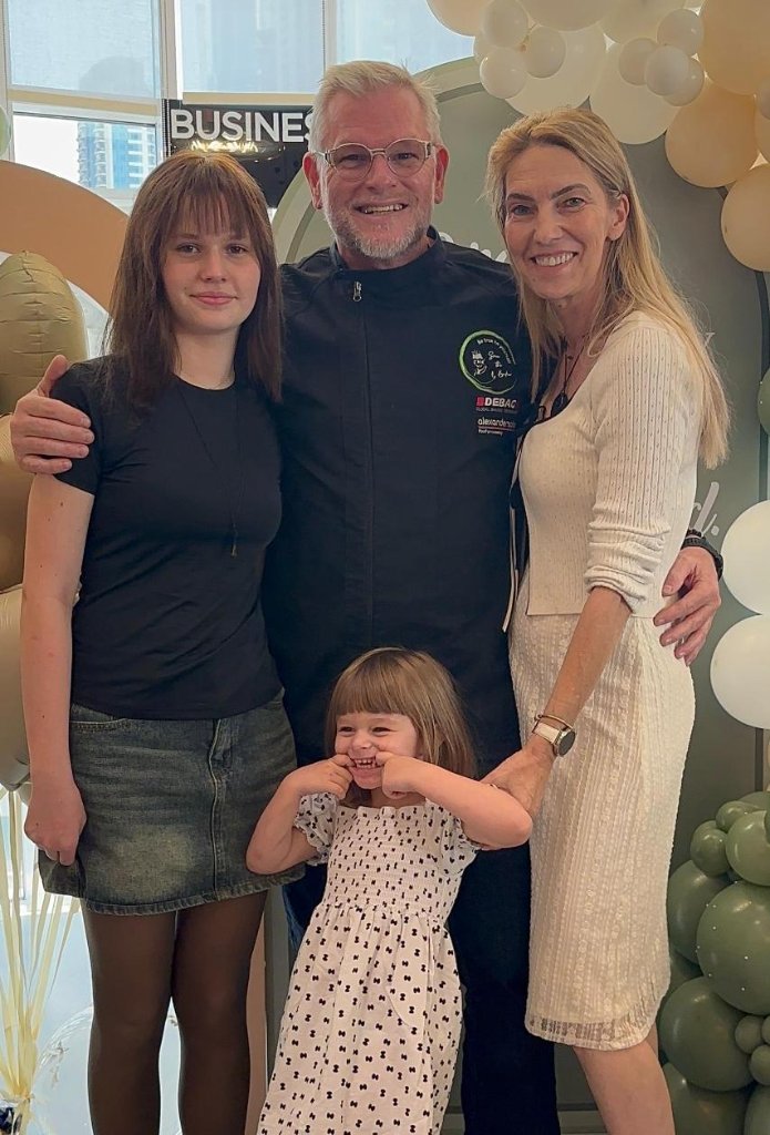 Familie bei Feier mit Ballons