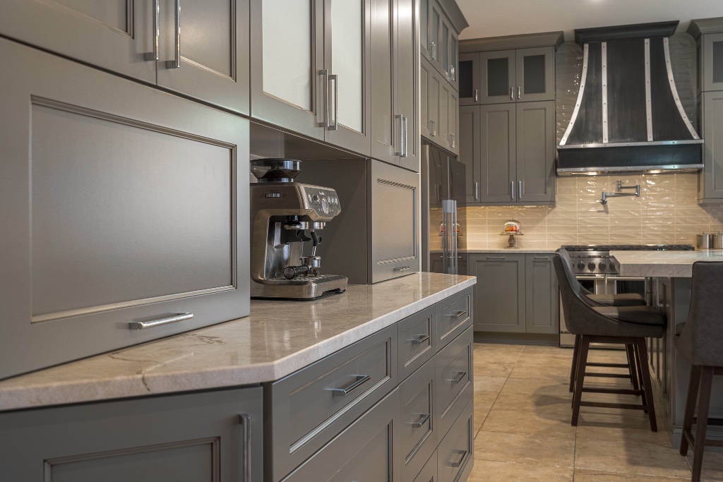 Cream stone countertop with subtle veining and polished chrome fixtures