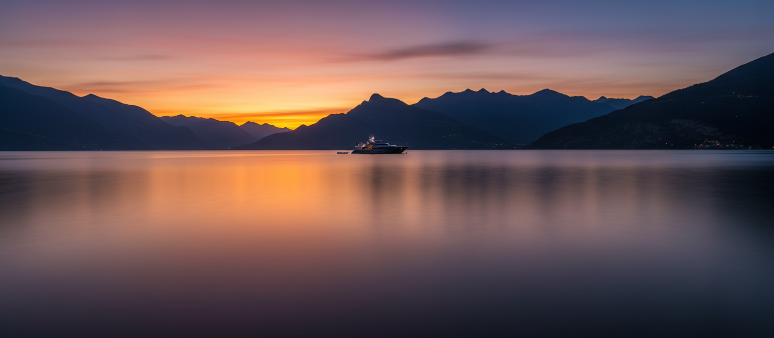 Sunset lake with boat wake