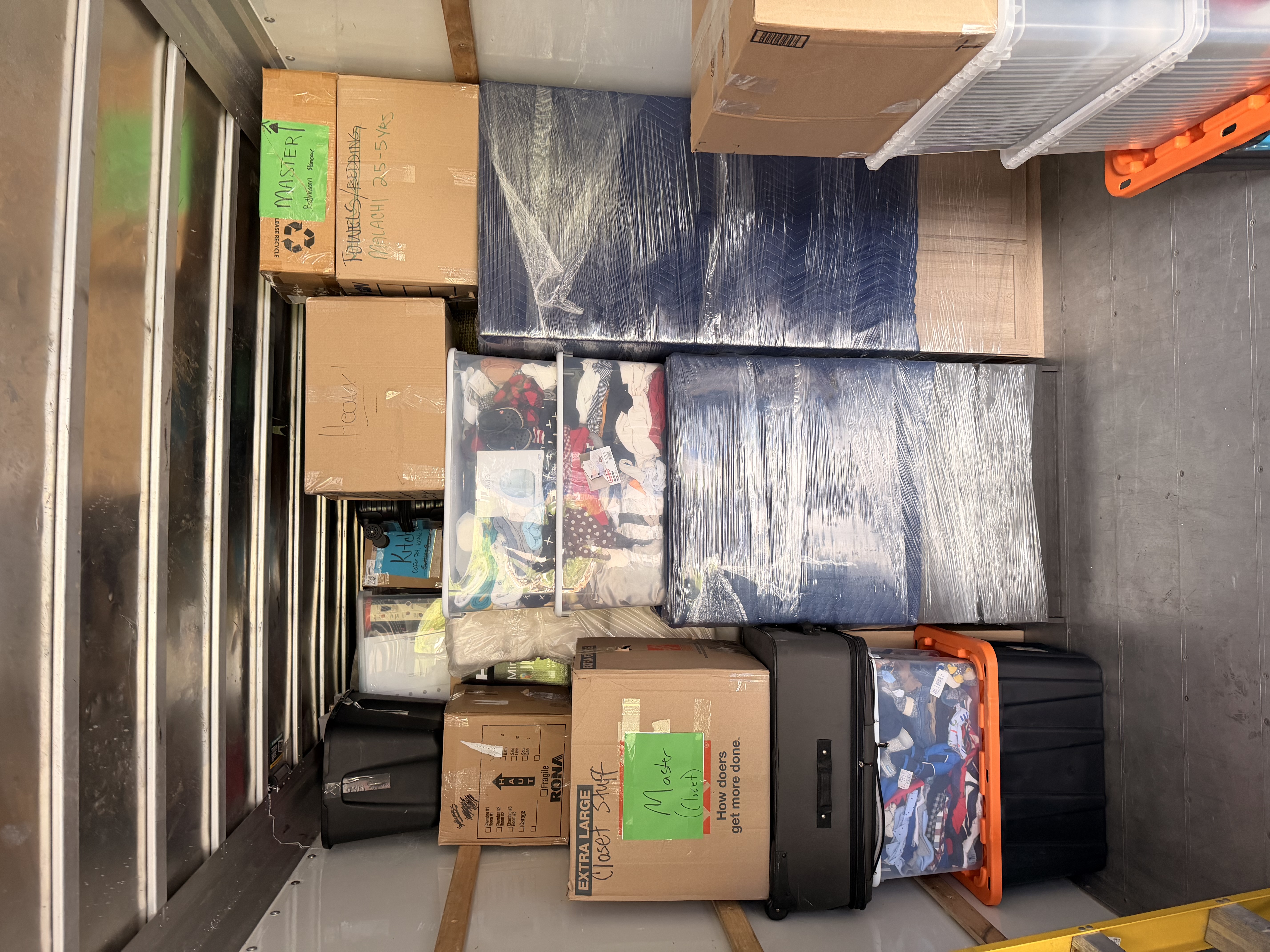 A fully loaded, securely packed moving truck