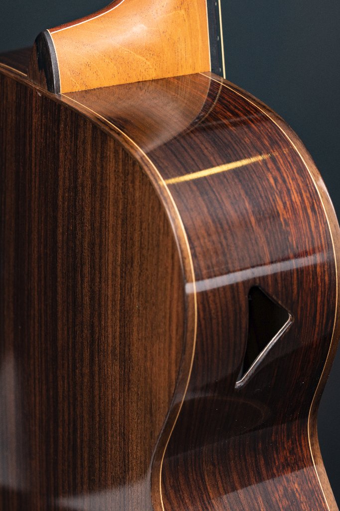 Rosewood guitar waist with a mirror-polished finish