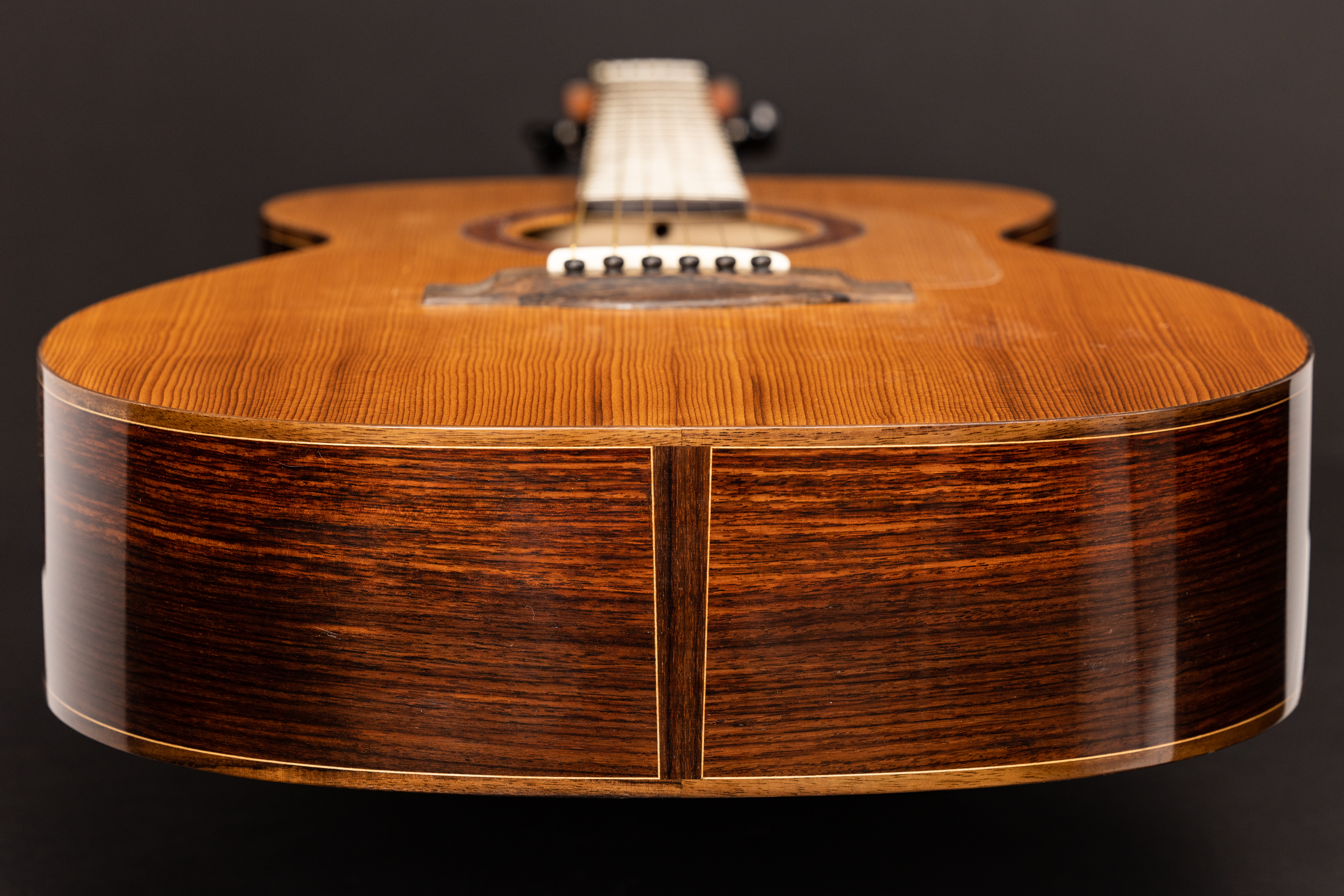 French-polished Alis Guitars acoustic guitar with soundboard and body in view