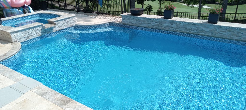 Pool and spa project with raised spa and spillway