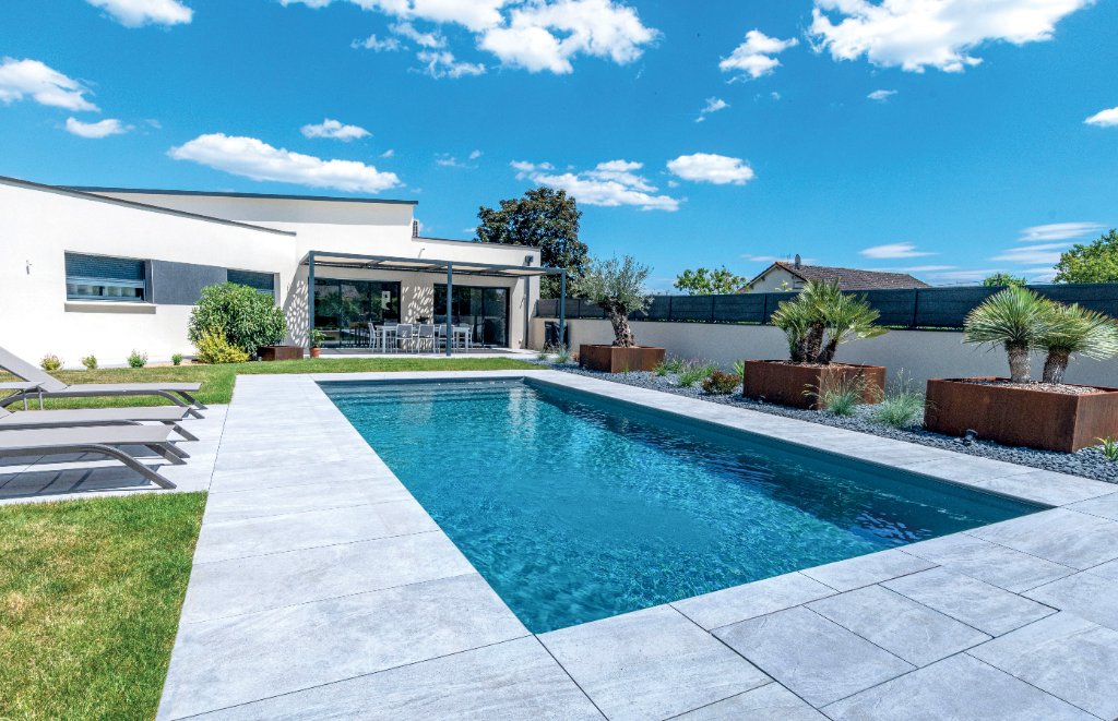 Clean residential pool with stone pavers in North DFW