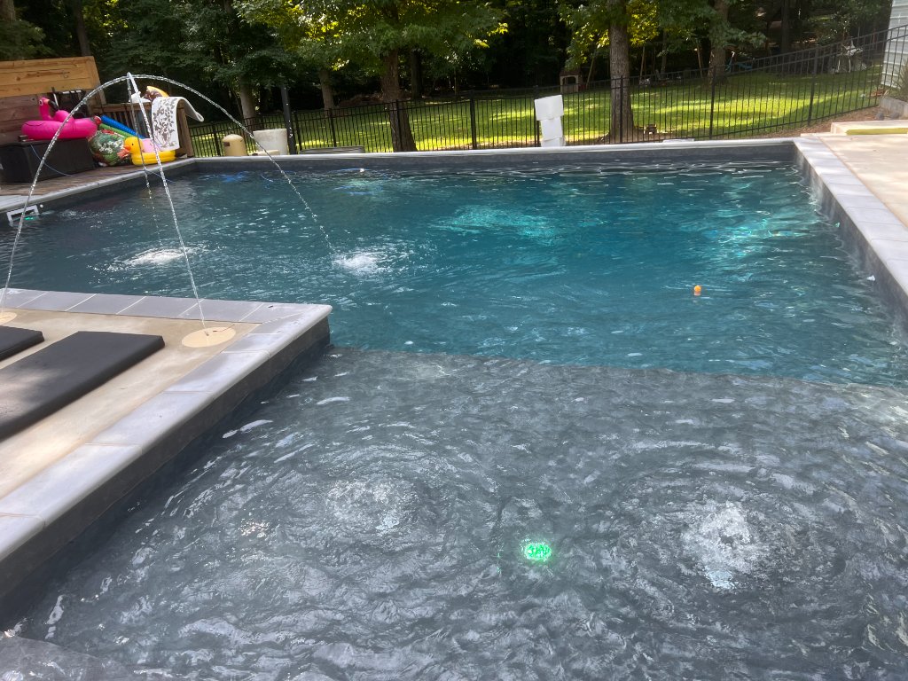 Clean residential swimming pool in North DFW maintained weekly by Sapphire Pools & Spa