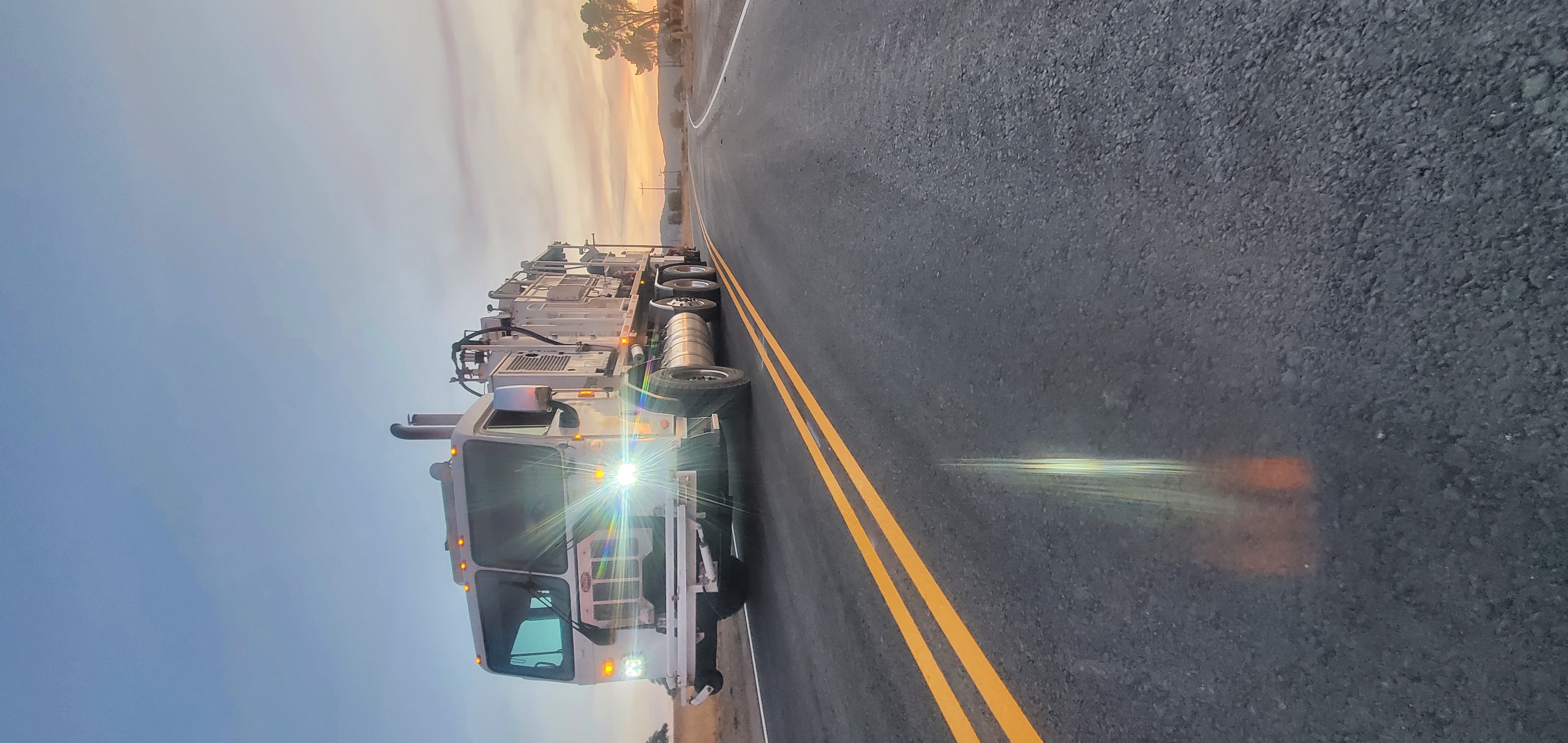 Thermoplastic striping truck at sunset in San Bernardino