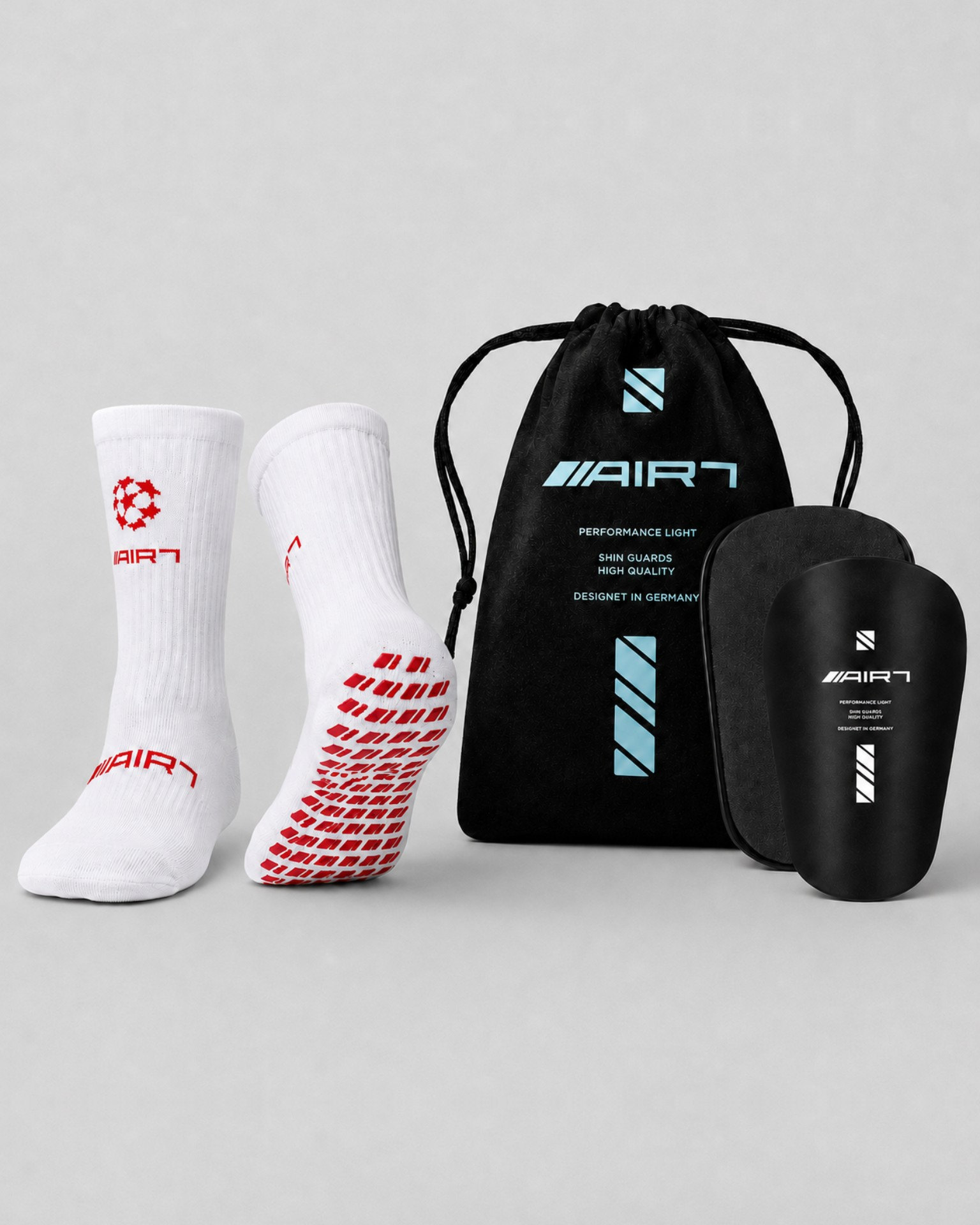 Air7 Pack: Gripsocks White/Red + Shin Guards Black von AIR7