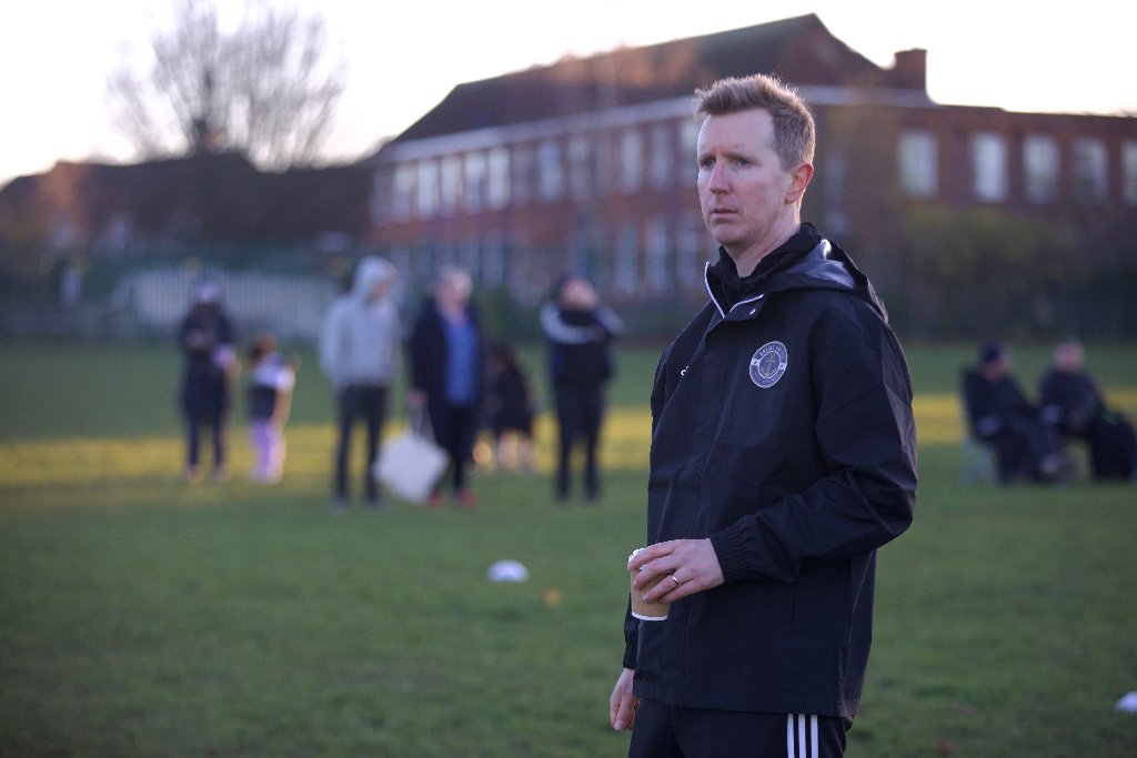 Coach watching training session