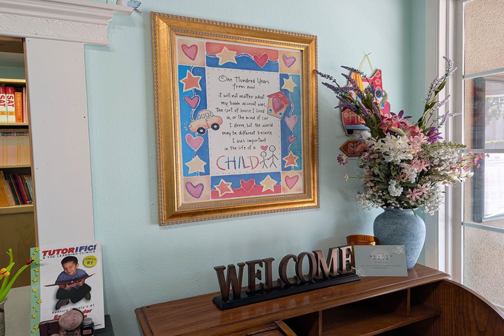 Tutorific waiting area with welcome desk and flowers