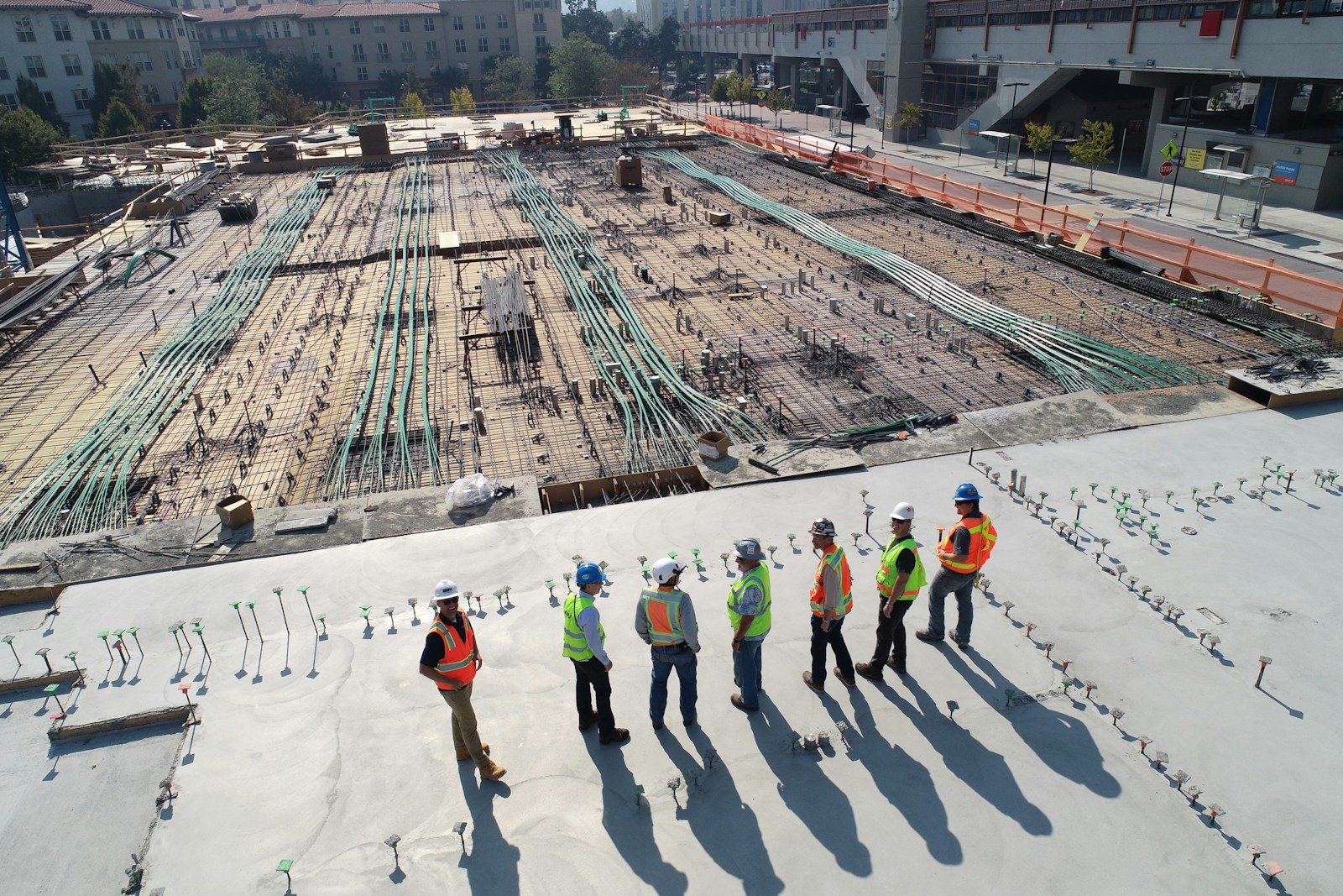 Field team gathered on an active construction site