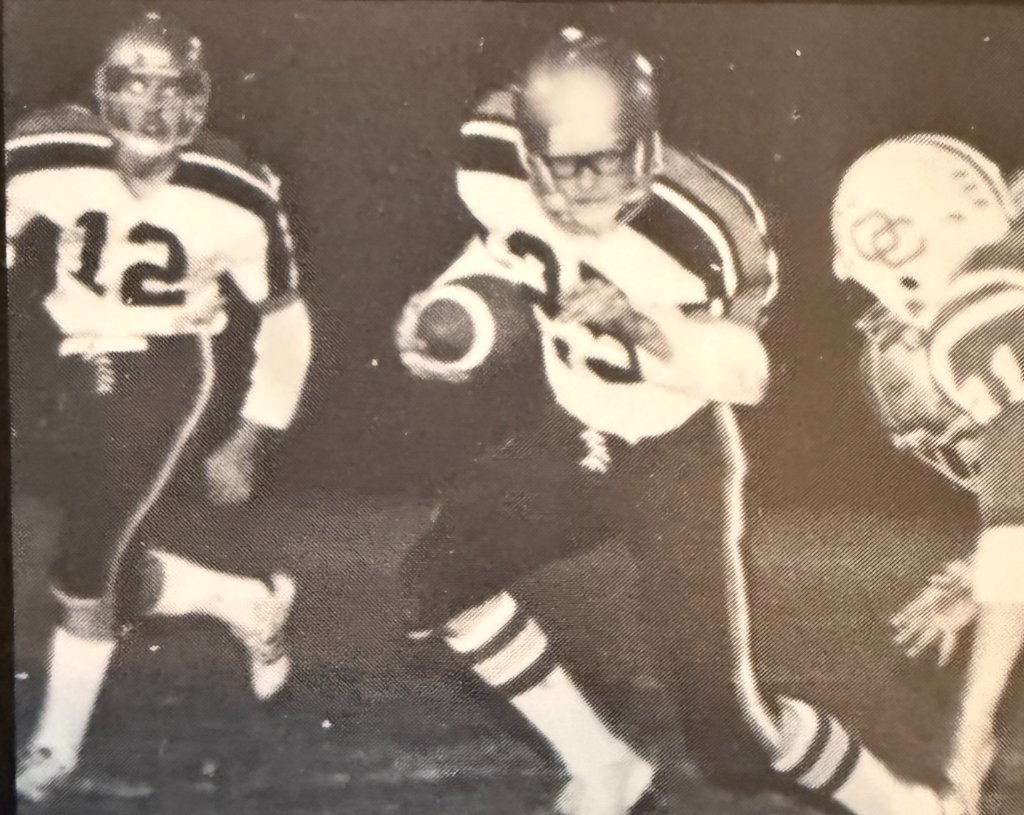 Football — #23 hits the hole with #12 leading the way