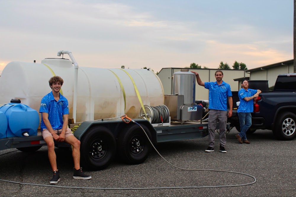 The Neat Freaks crew with their pressure washing rig in Shelby, NC