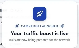 Campaign launched confirmation showing rocket icon with 'Your traffic boost is live' and 'Tasks are now being prepared for the network'