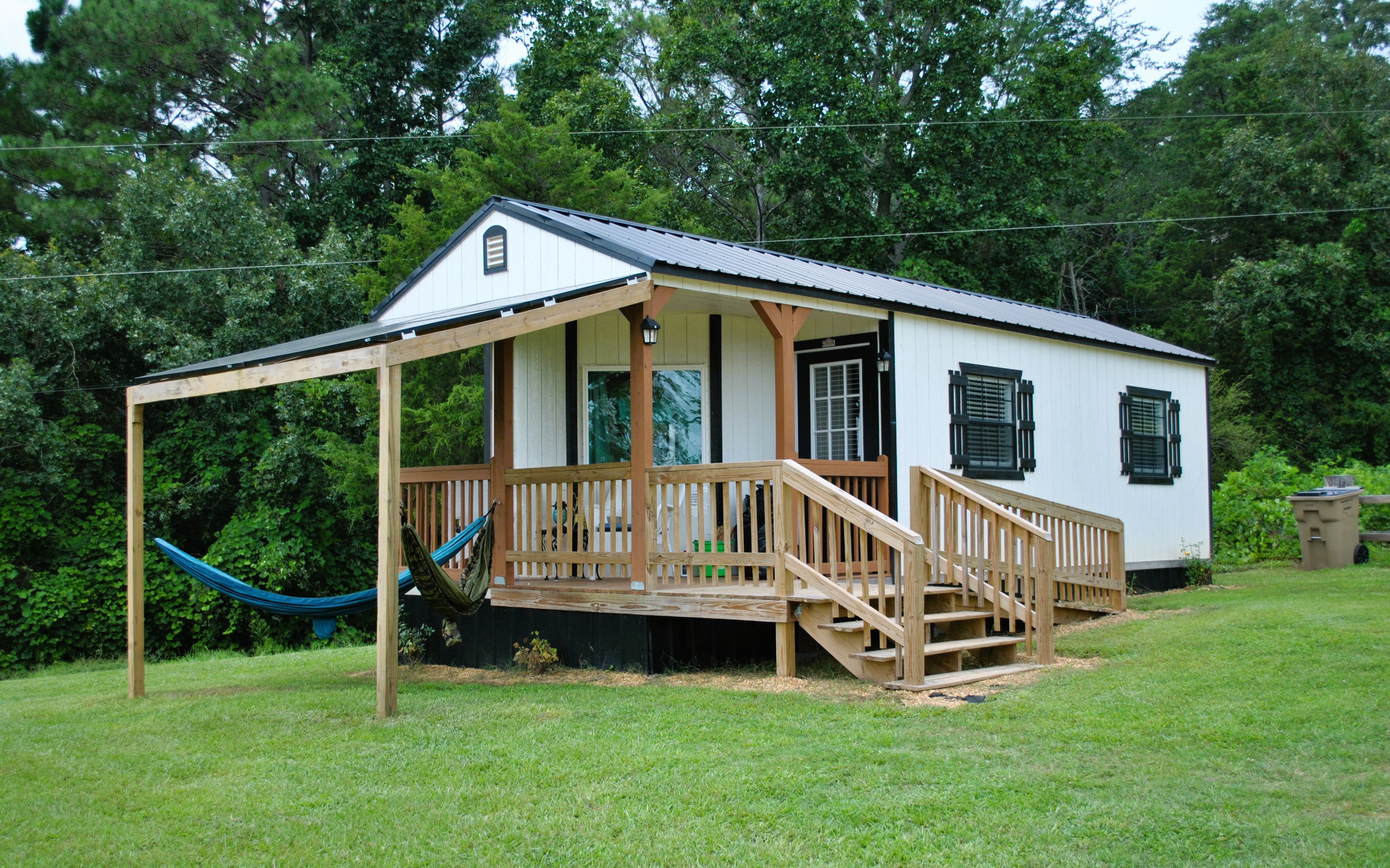 Exterior of the Cloud Nine tiny house with covered porch