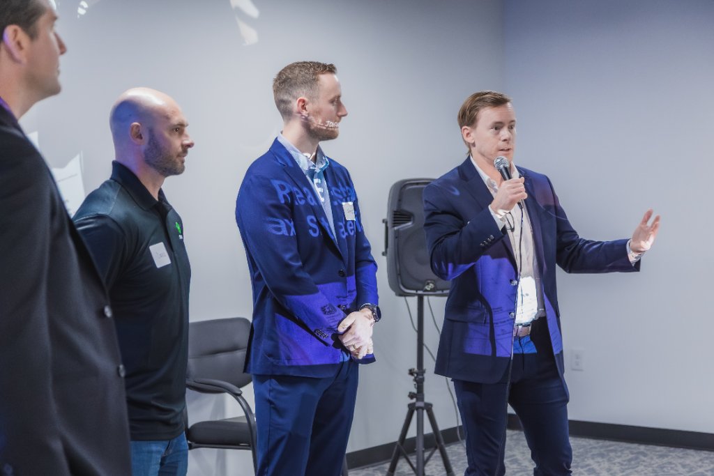 A packed room of engaged investors throughout the evening 3