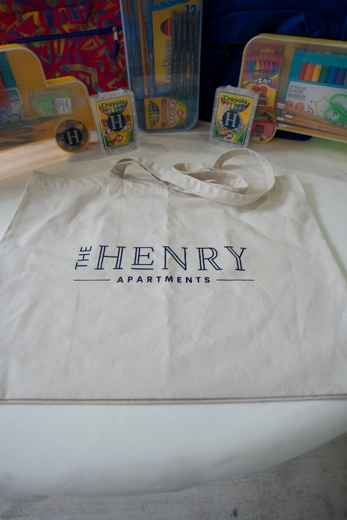 Bounce houses, face painting, a live DJ, and backpacks full of school supplies at The Henry at New Forest 4