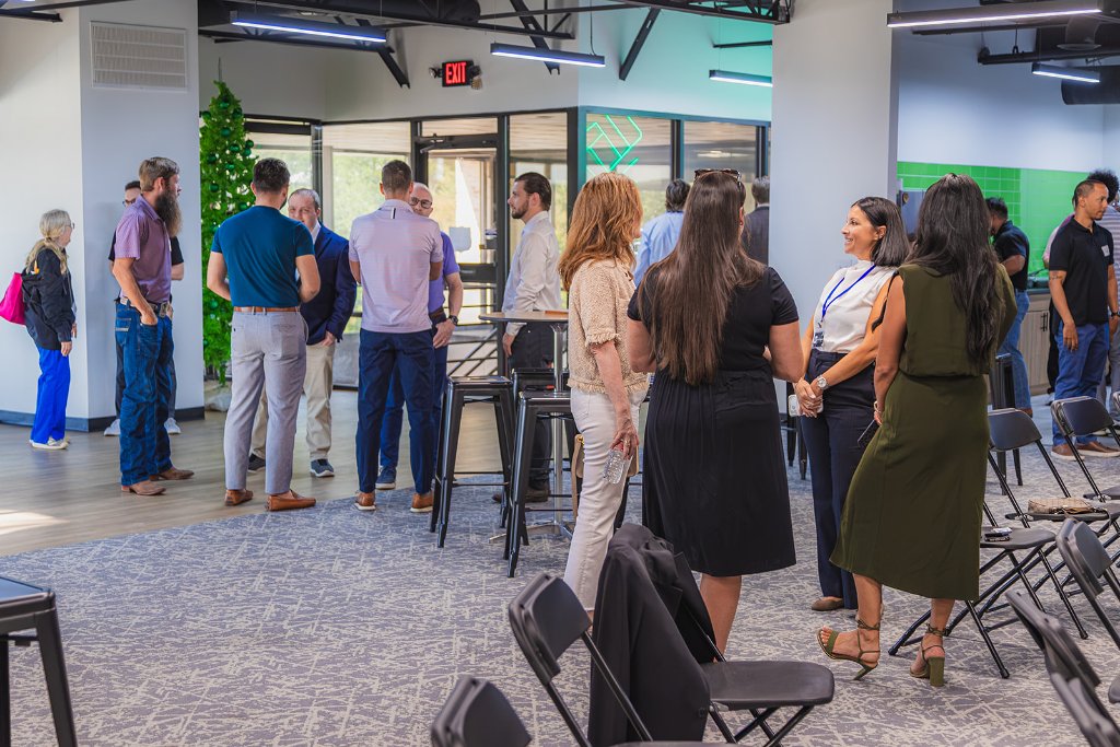 Conversations, connections, and energy throughout the room 13