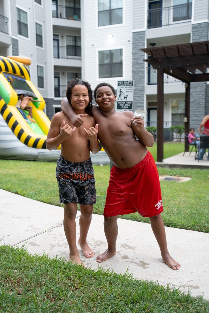 Bounce houses, face painting, a live DJ, and backpacks full of school supplies at The Henry at New Forest 8