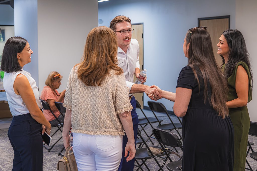 Conversations, connections, and energy throughout the room 14