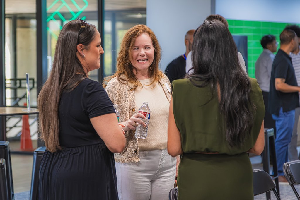 Conversations, connections, and energy throughout the room 7