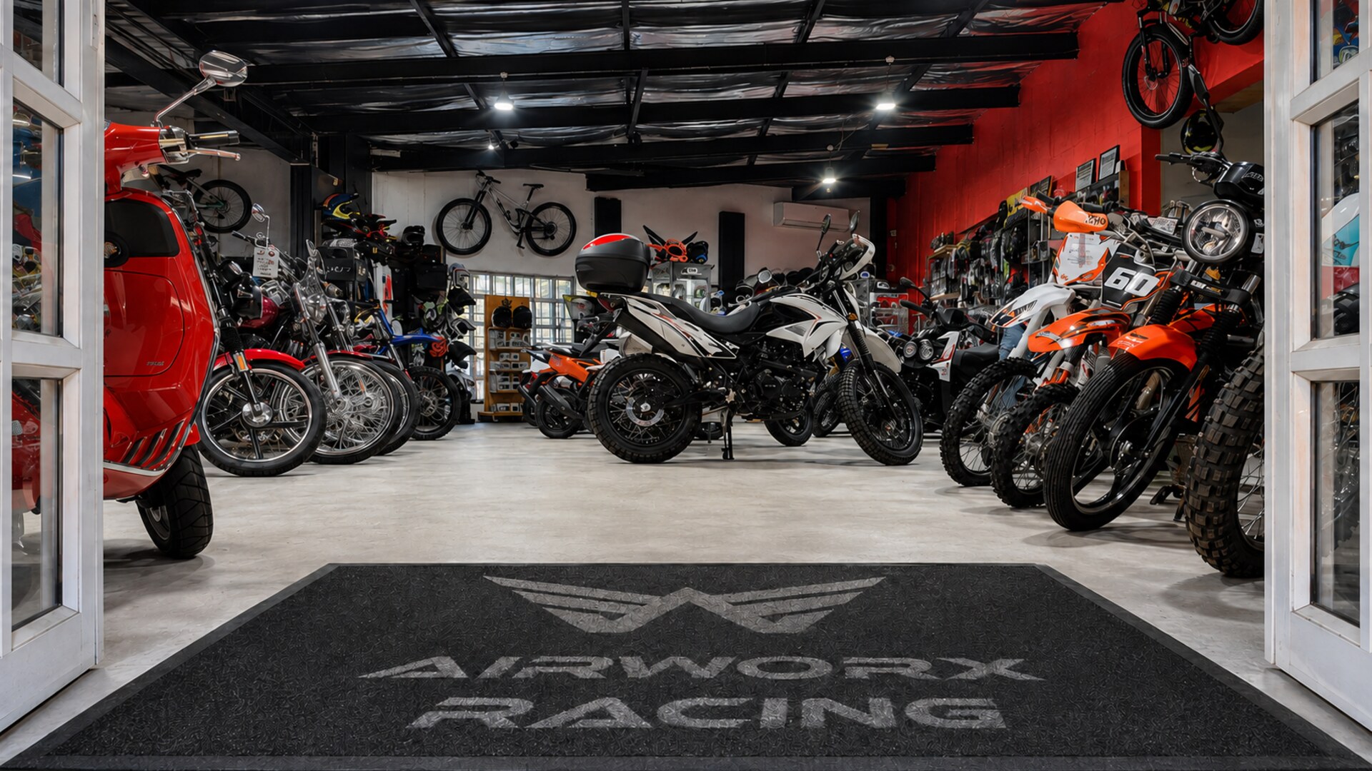 Looking through the open doors onto the Airworx Racing showroom floor
