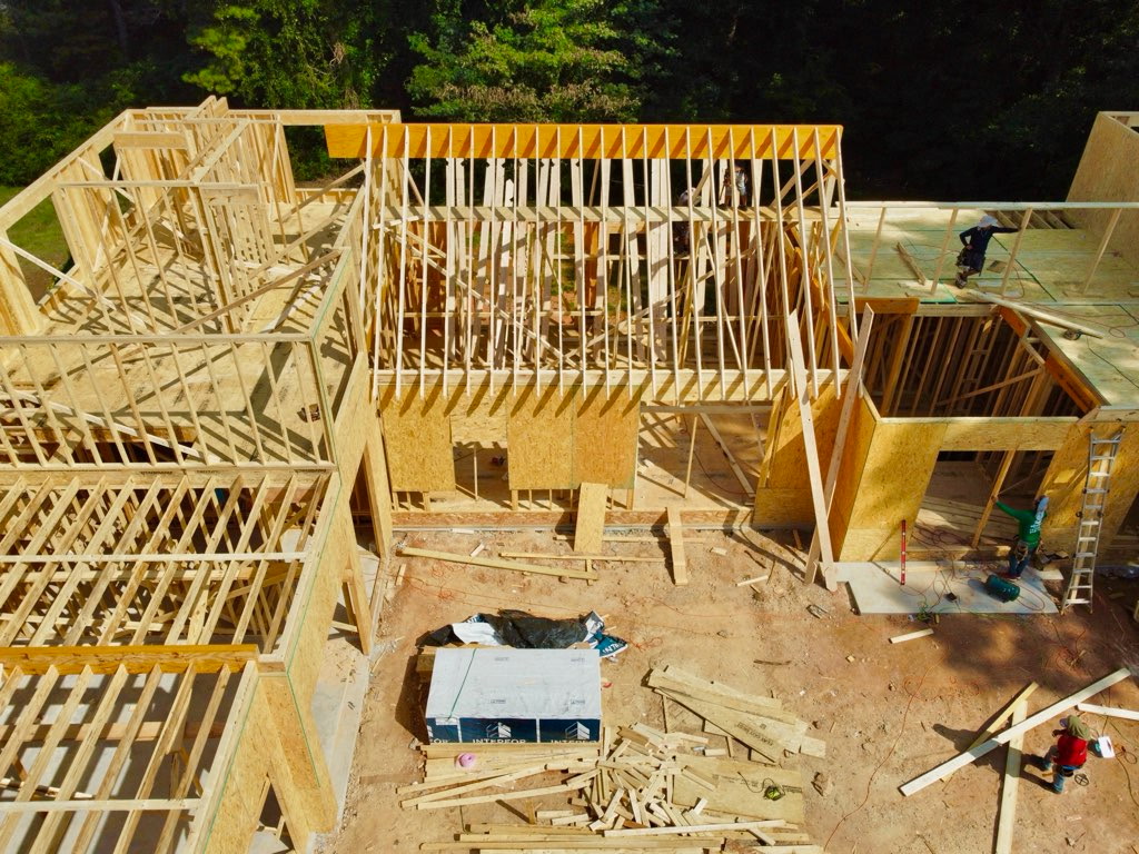 Framing progress at 56 Cooper Lake Rd SW, September 18, 2026 — A closer look at the rising walls and structural framing.