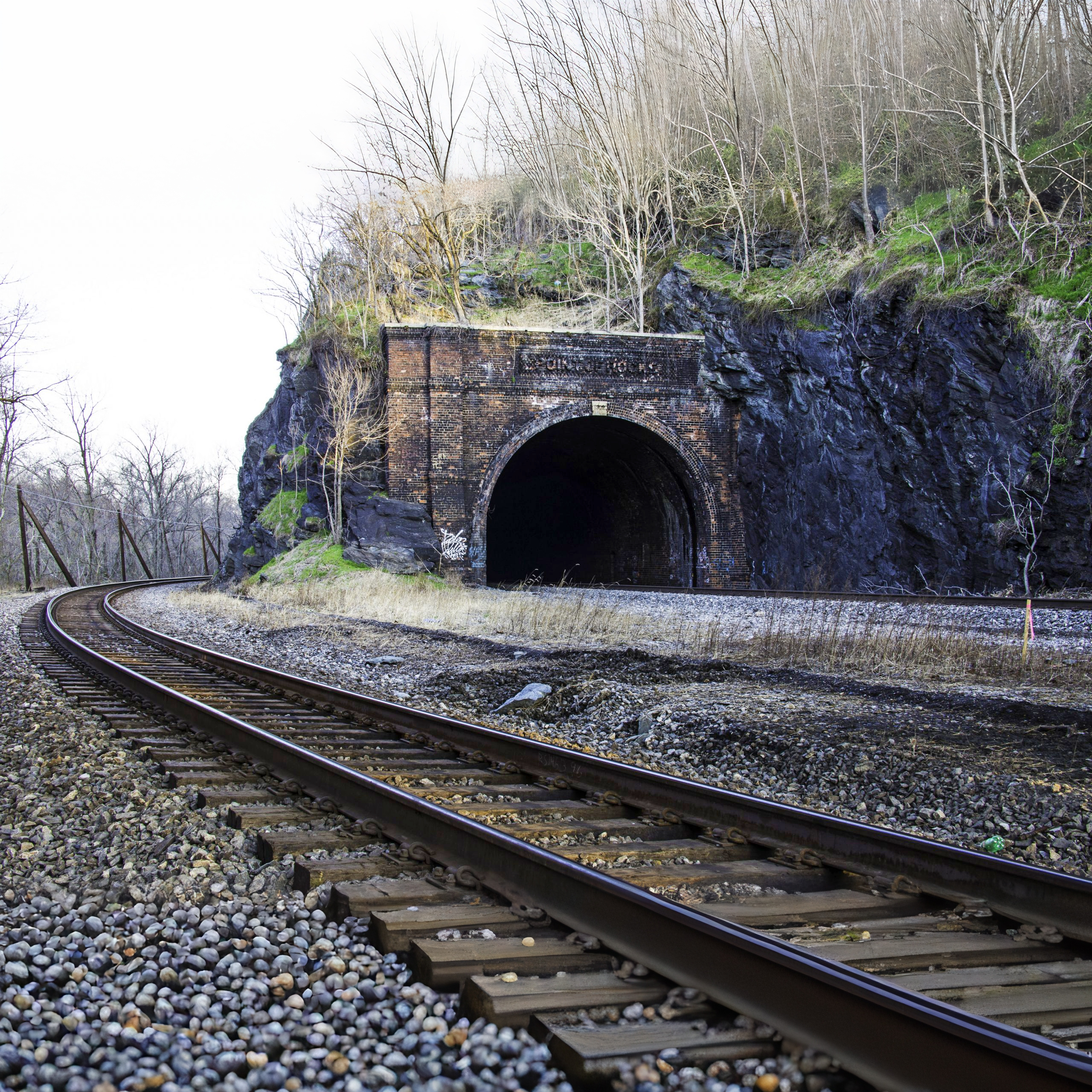 The railroad tunnel at Point of Rocks — where the canal and the railroad learned to share the cliff.