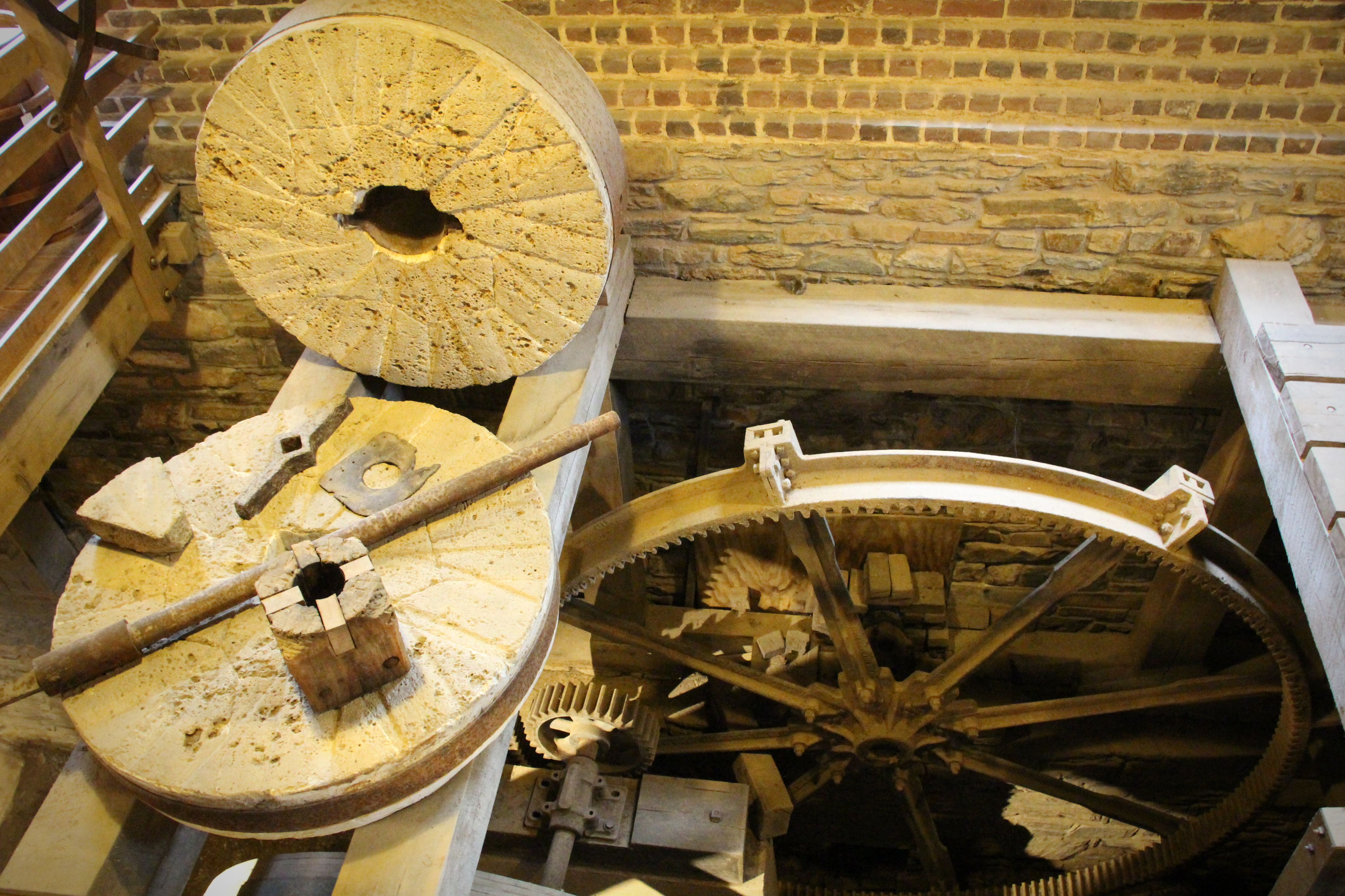 Millstones and gearing from above — the heart of the mill’s second floor.