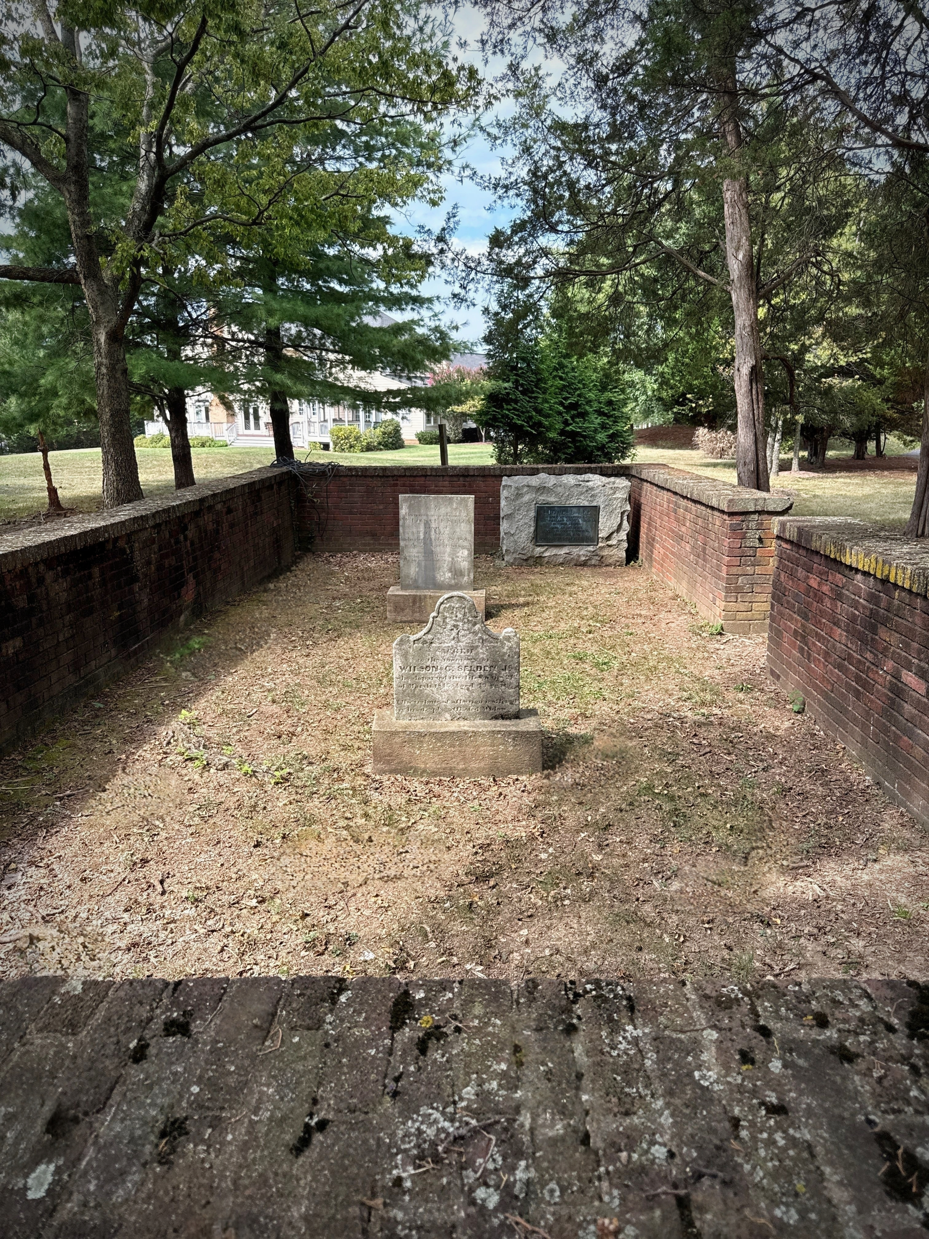 The Lee family burying ground at Belmont — a brick-walled enclosure west of the house, holding the graves of Ludwell Lee and Frances Carter Lee.