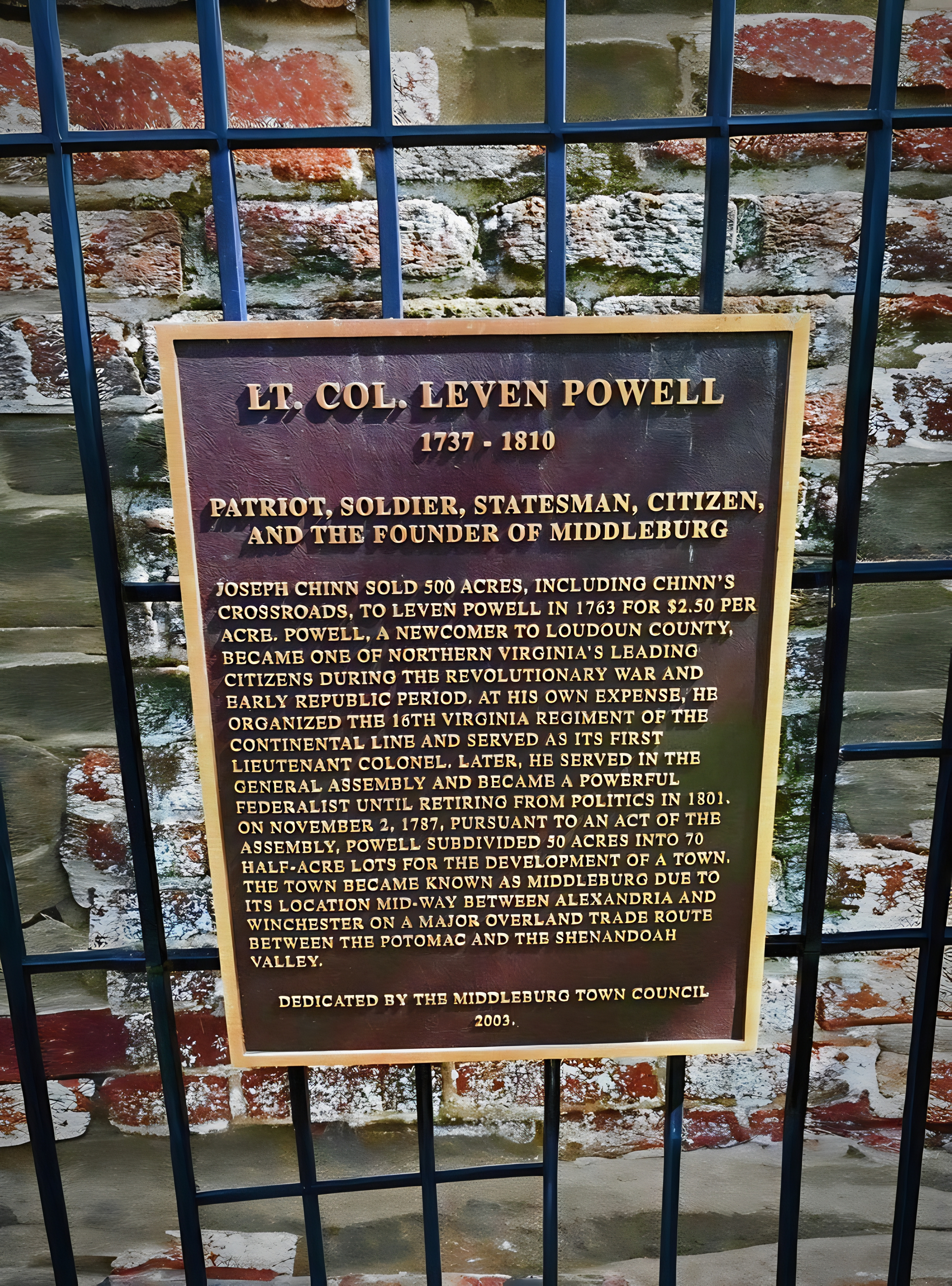 A bronze marker honoring Leven Powell, the Revolutionary officer who founded Middleburg in 1787, stands within sight of the inn.