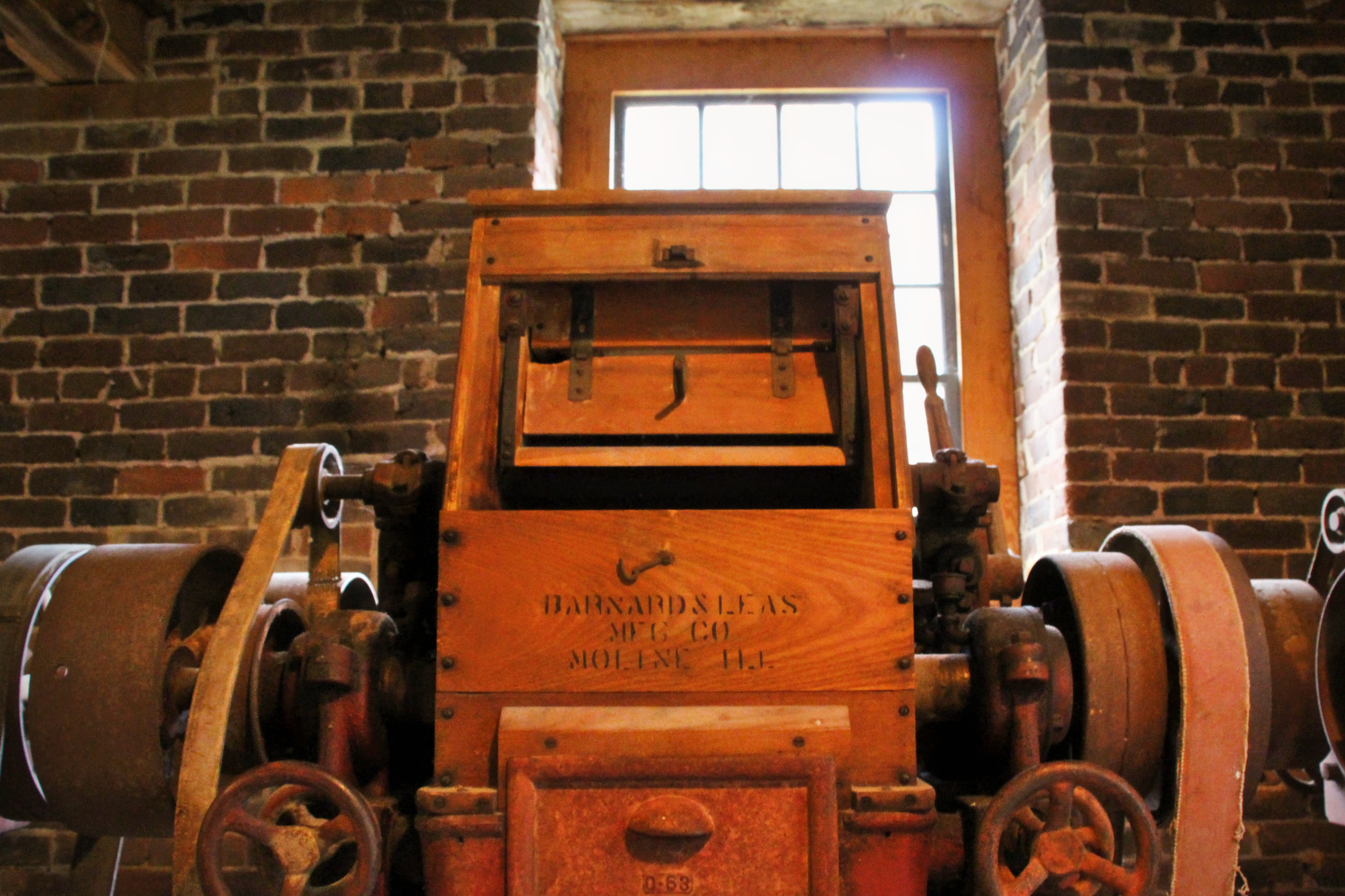 A Barnard & Leas manufacturing machine, stamped Moline, Ill. — industrial equipment that reached Loudoun as the mill evolved.