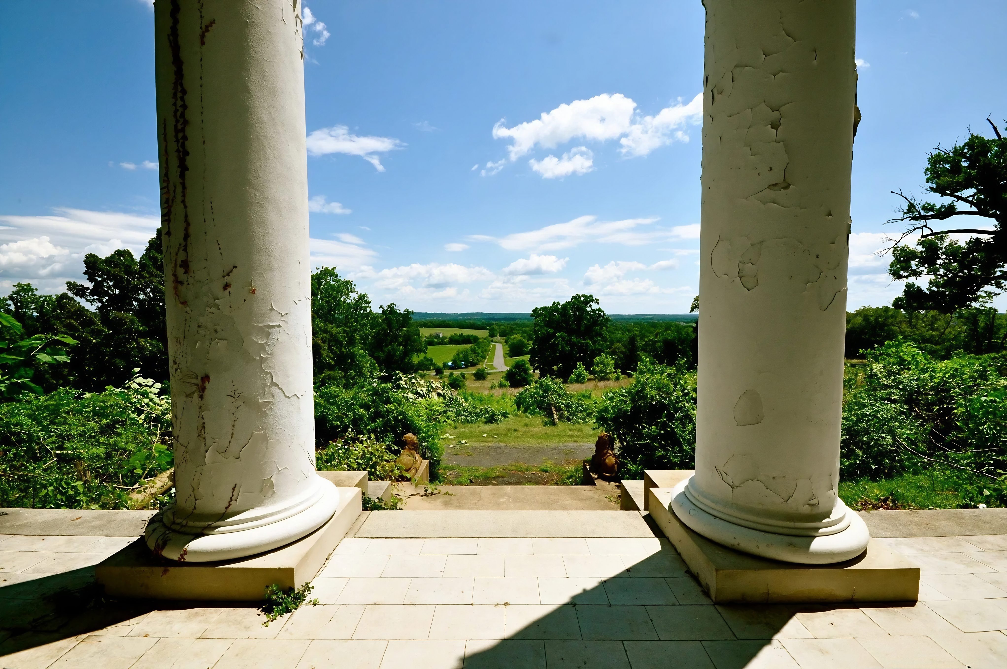 Looking through Selma's weathered columns across the Loudoun County landscape