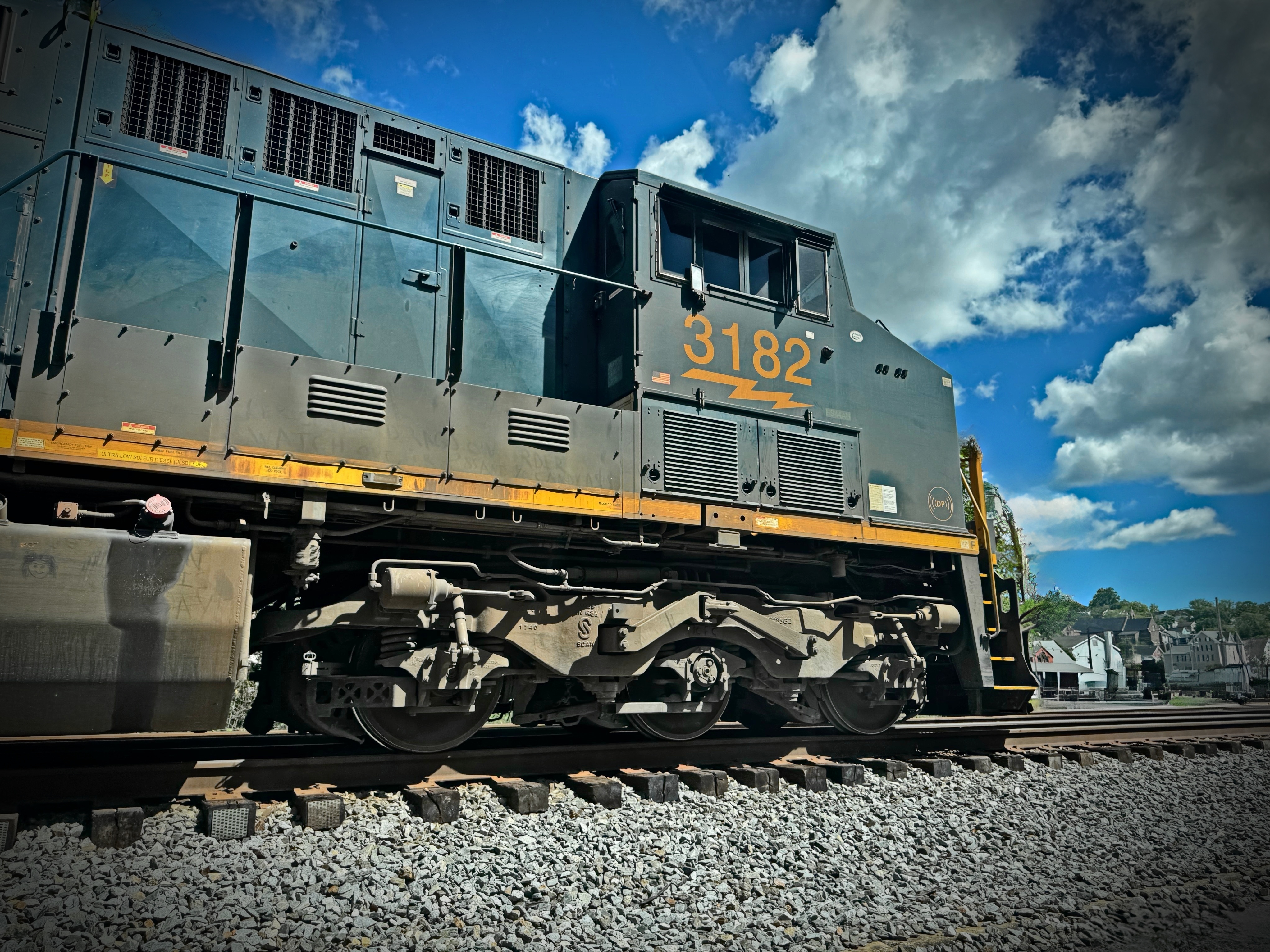 A CSX diesel freight at rest at Harpers Ferry — the iron that inherited the canal’s path along the Potomac.