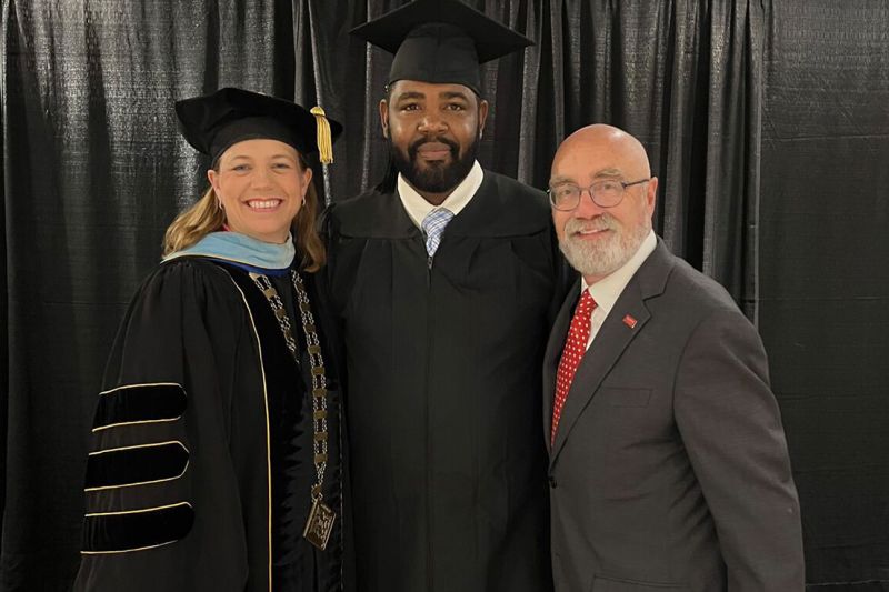 Delante Clark walking at Valencia College commencement