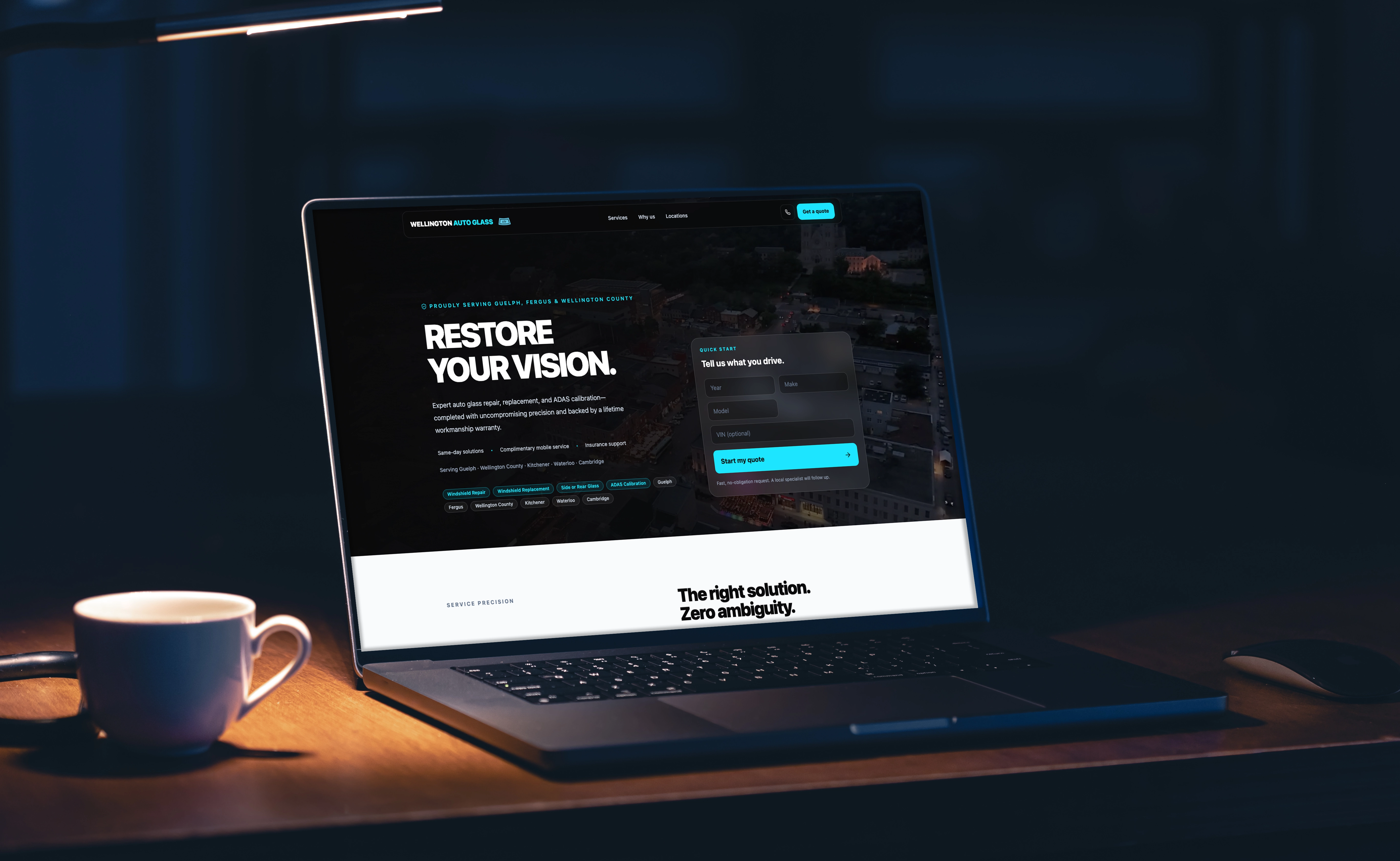 Wellington Auto Glass website shown on a laptop
