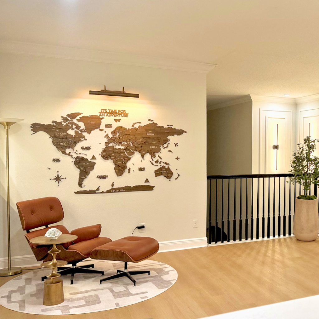 Family room and staircase in a full-home renovation by ANA Studio