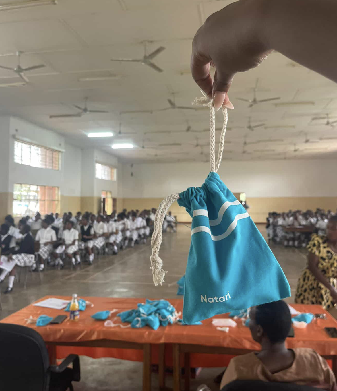 A Natari menstrual cup pouch held up during a school distribution in Zambia
