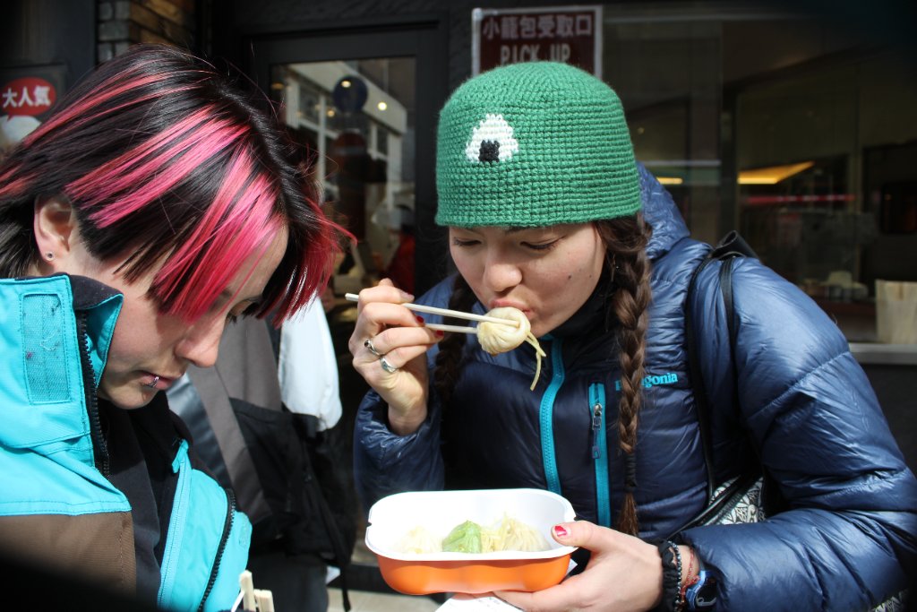 Women eating dumplings in Japan