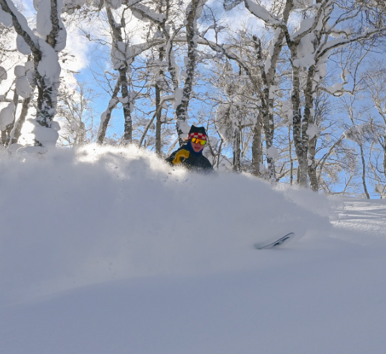 Skier buried in deep powder in Hokkaido