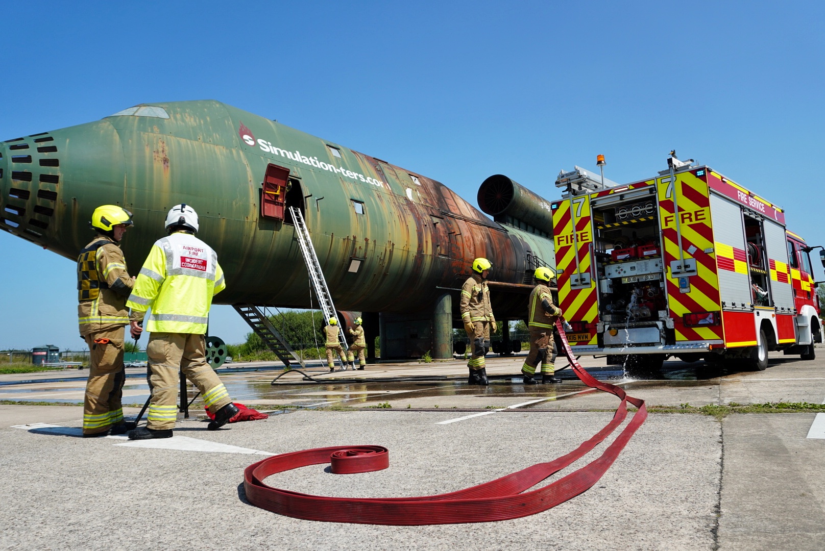 Green Watch carry out a combination drill covering ladders, pumps and breathing apparatus on the airport’s dedicated training rig.