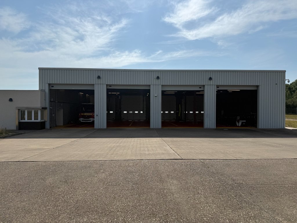 DSA Airport Fire Station, bays open, appliance on standby