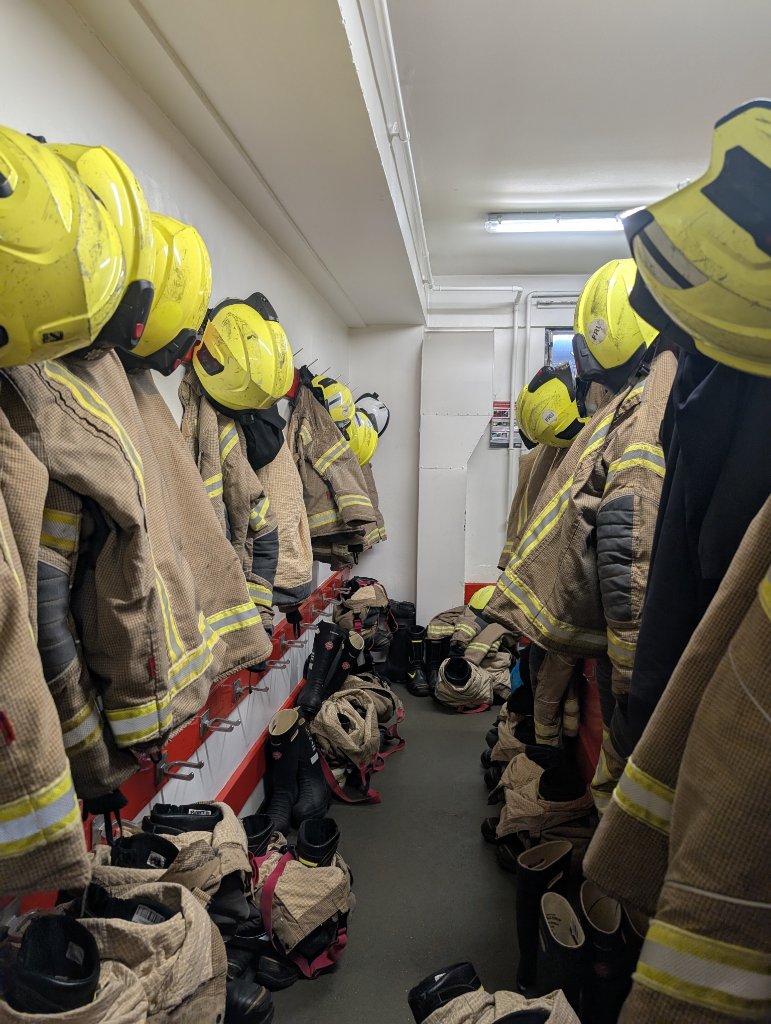 Fire kit hanging ready in a station PPE corridor