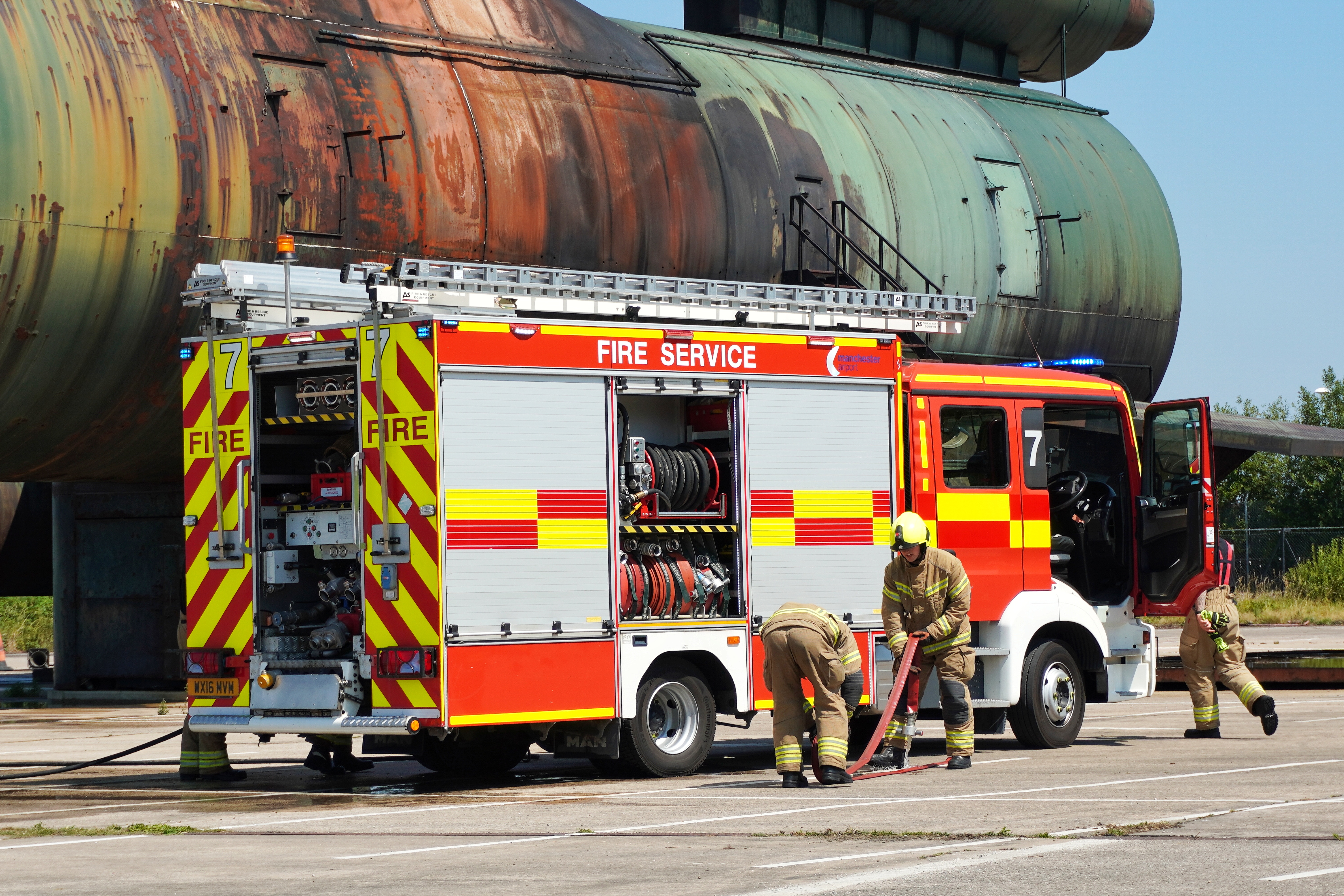 Crews make up hose lines after the combination drill, getting equipment back on the run ready for operational response.