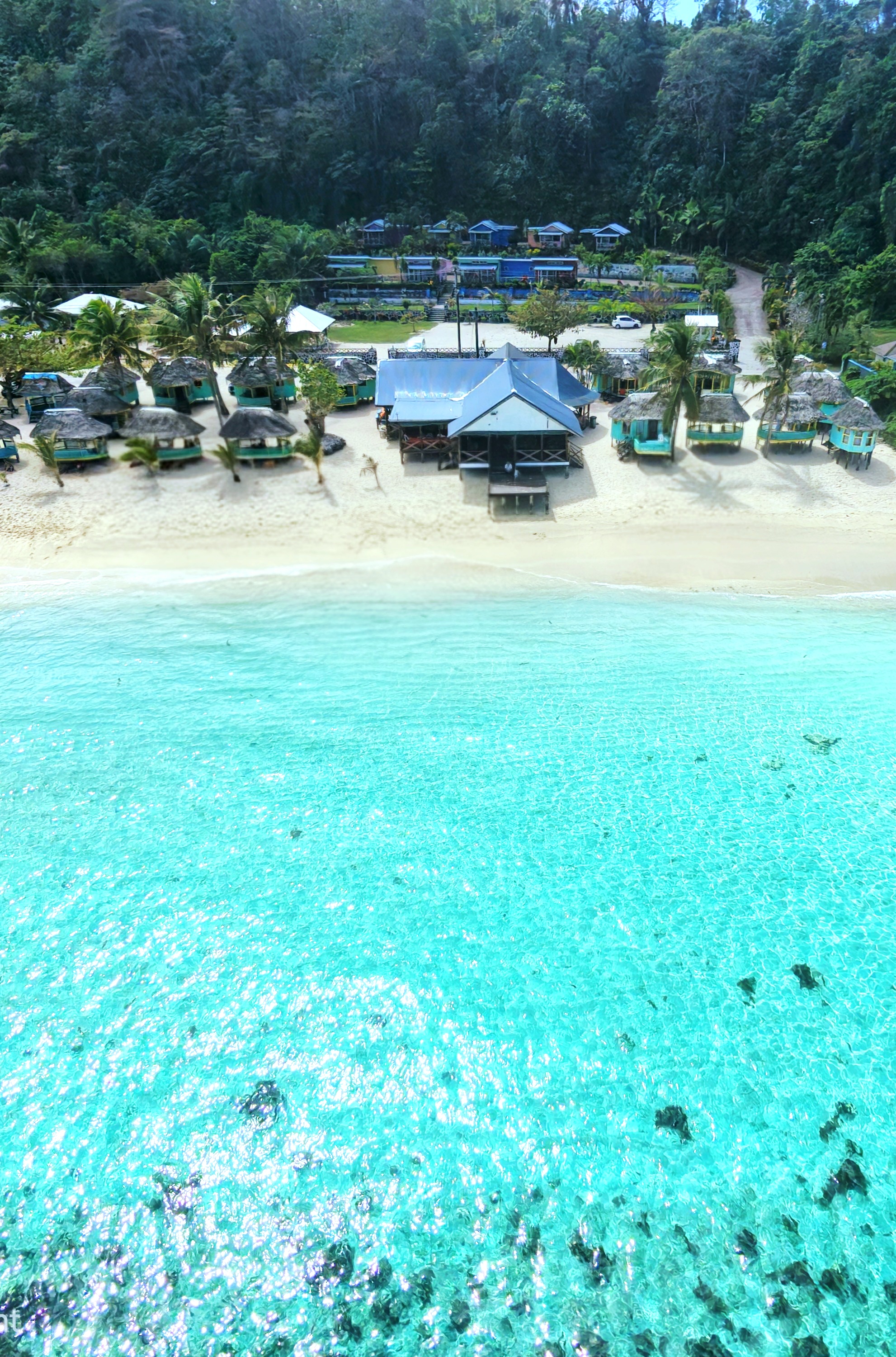Samoa beach fales on Lalomanu Beach — traditional Polynesian accommodation at Taufua Beach Fales