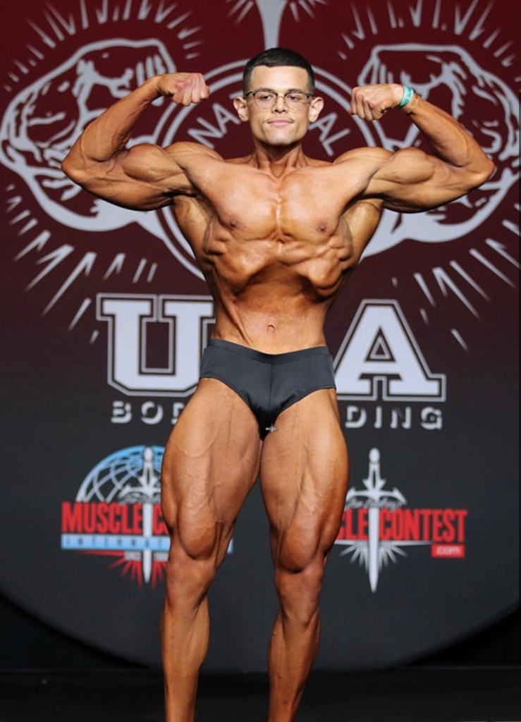 Walter on stage at a bodybuilding competition
