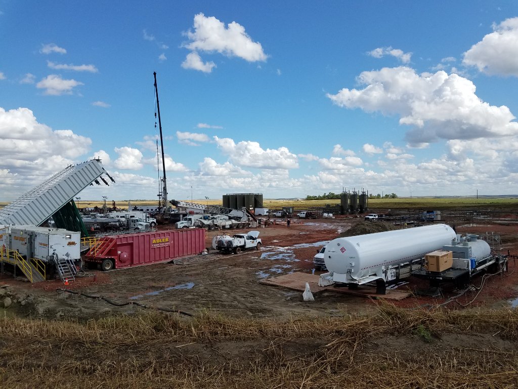 United Energy field personnel assembling power generation equipment during a documented pre-deployment operation