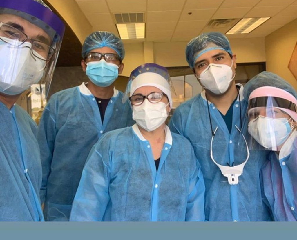 Dr. Navarro and the OrthoLogo care team in PPE